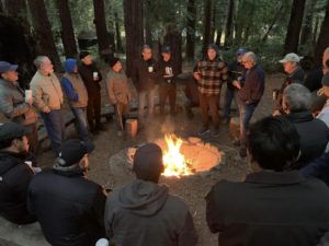 Group of men around a fire